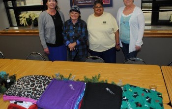 Rosewood Aktion Club Donates Blankets to Family Crisis Center