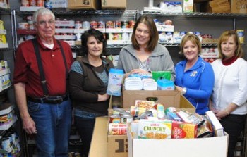 Rosewood Services Delivers Food and Funds to Food Bank of Barton County