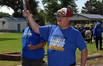Storm Special Olympics Joins Law Enforcement for Torch Run in Larned